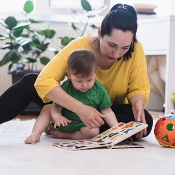 Mother and son are playing together